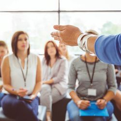 Leader addresses a group of trainees