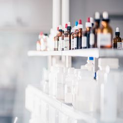 Scientist looks at reagent inventory