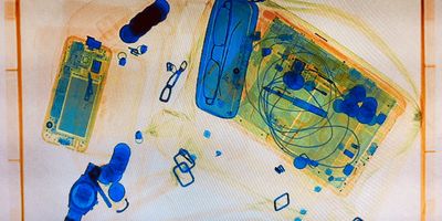 Luggage going through an x-ray machine